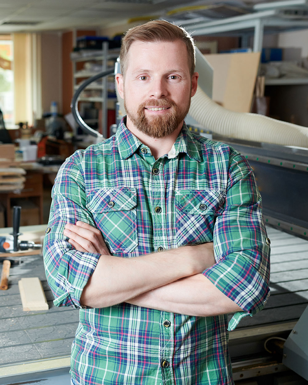 Carpenter In Woodworking Shop 28HRJ3S
